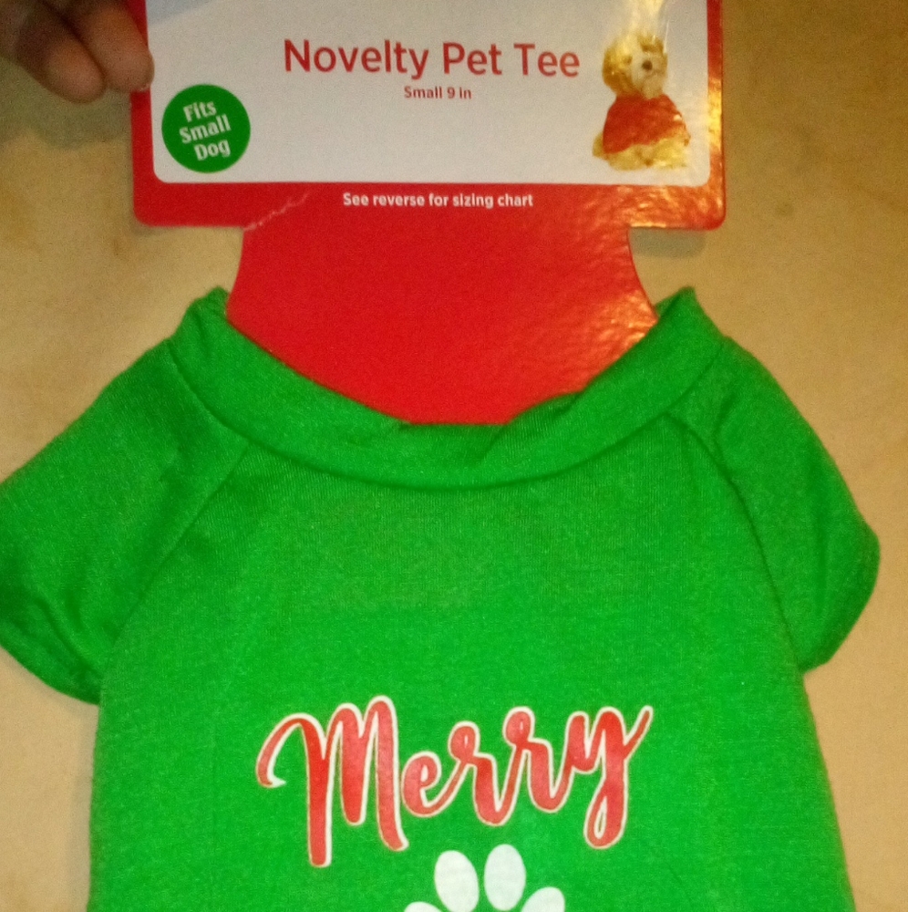 A very cute Christmas outfit for you small dog green in color fits small dogs